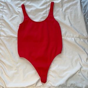 Red body suit
